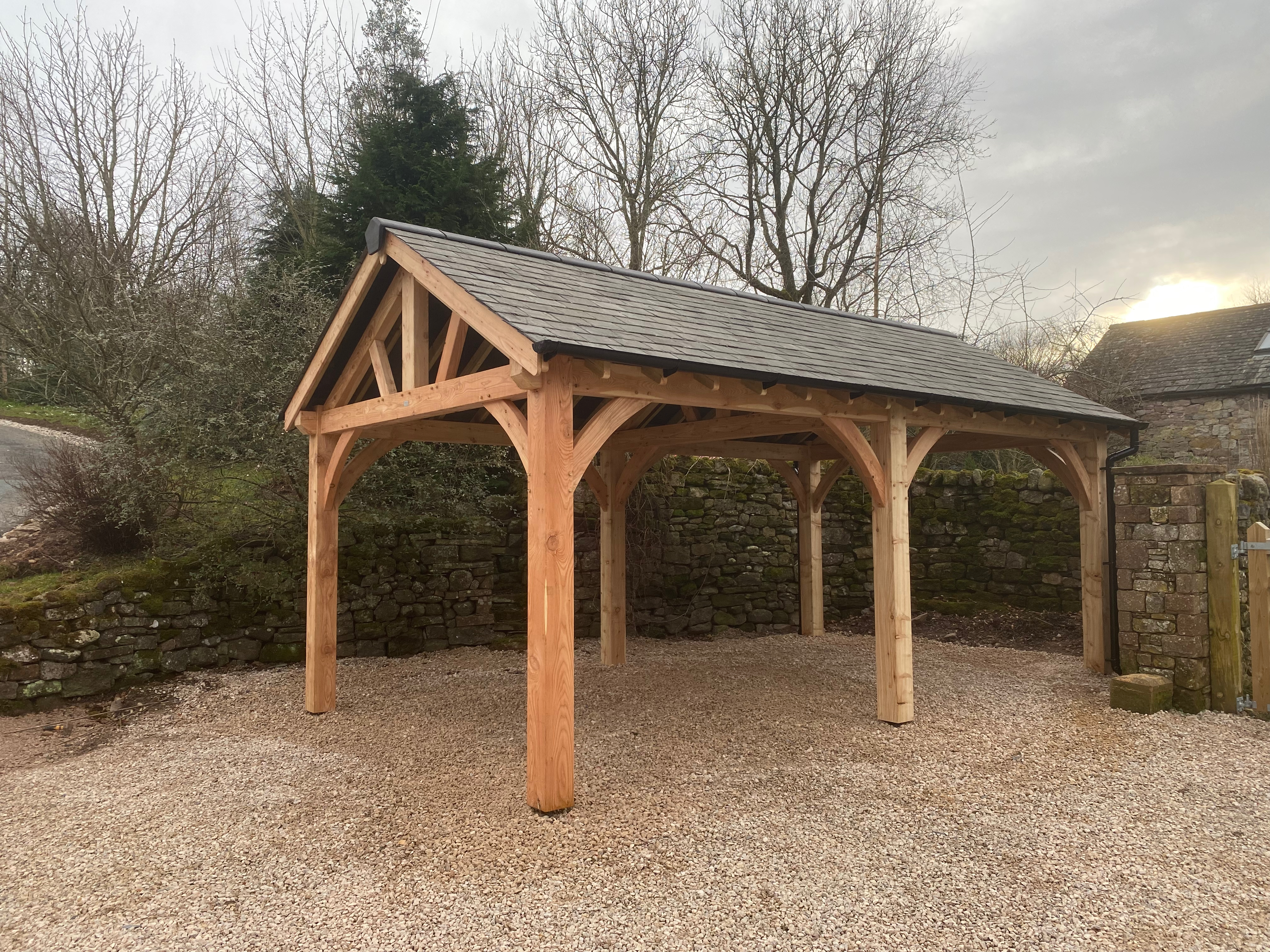 Oak-framed garage or carport by Woodstyle Joinery