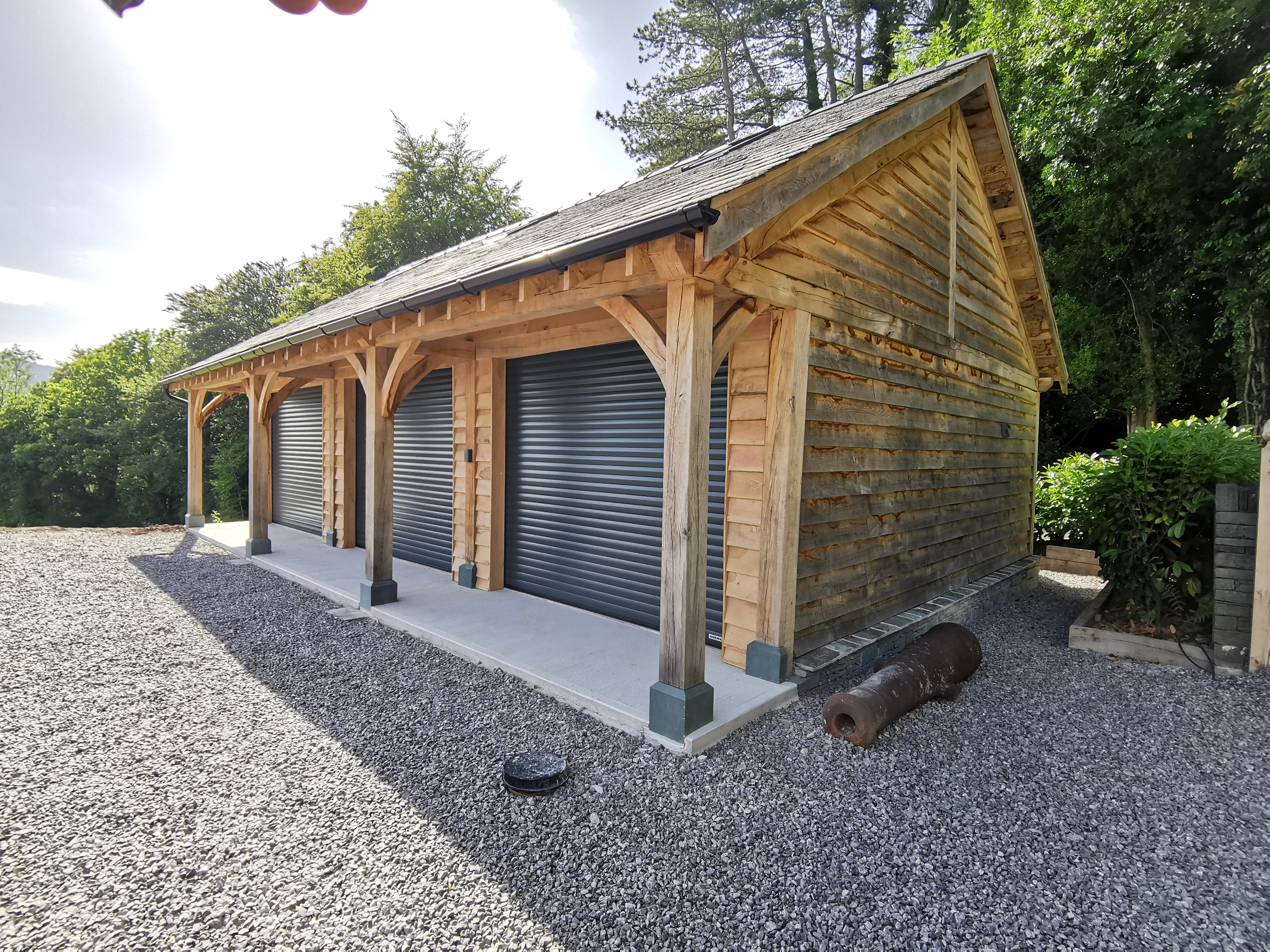 Oak-framed garage or carport by Woodstyle Joinery