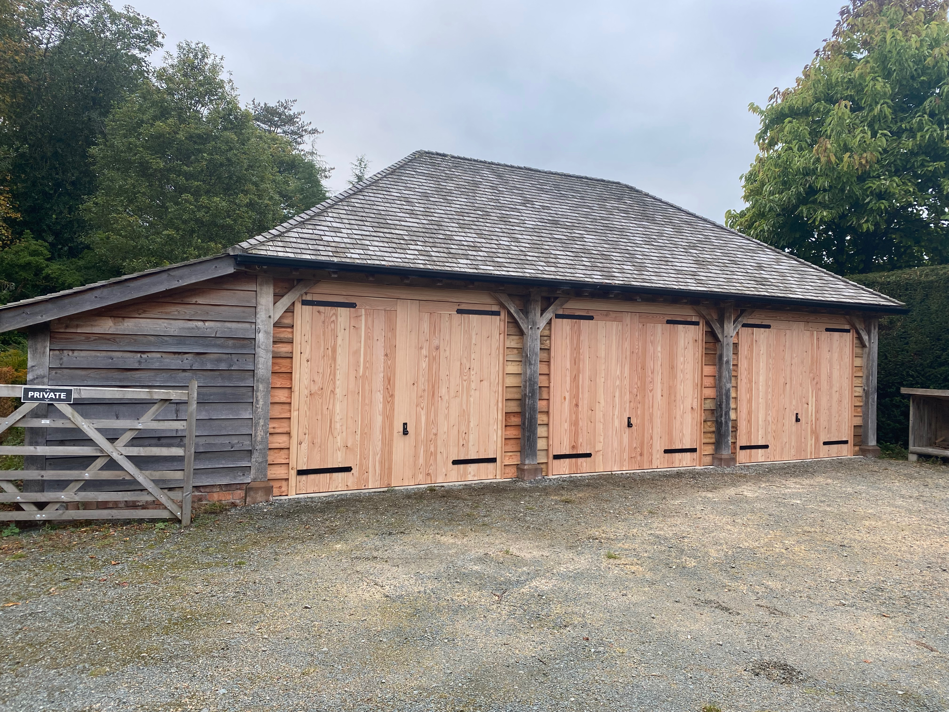 Oak-framed garage or carport by Woodstyle Joinery