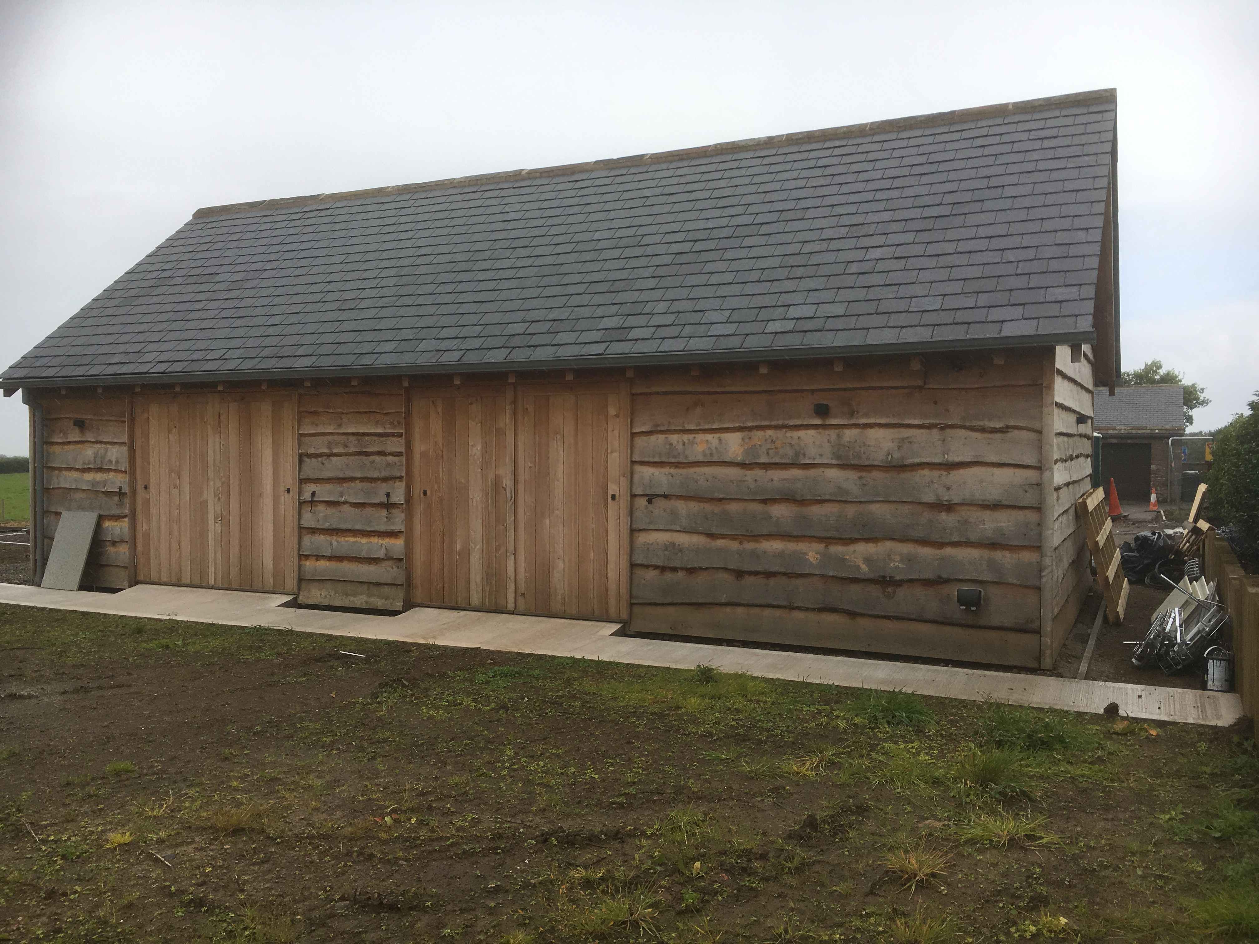 Oak-framed garage or carport by Woodstyle Joinery